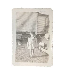 Vtg Child Posing Next to Vehicle Monochrome Photography Found Snapshot B&W